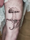 Tatouage d'un champignon avec tentacules