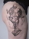 Tatouage sur cuisse représentant une danse entre un squelette et une femme