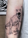 Tatouage de dinosaure T-Rex sur avant-bras